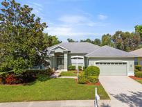 One-story house with a two-car garage and landscaped yard at 1206 86Th Nw Ct, Bradenton, FL 34209