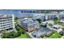 Waterfront condo building with private balconies at 1477 Park Beach Cir # 13, Punta Gorda, FL 33950