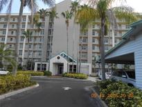 Condo building exterior with palm trees and parking at 2320 Terra Ceia Bay Blvd # 103, Palmetto, FL 34221