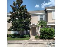 Two-story townhouse with a landscaped front yard at 6209 Flagfish Ct, Lakewood Ranch, FL 34202