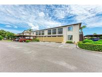 Condo building exterior with parking at 2812 72Nd Street W Ct # Blg 27, Bradenton, FL 34209