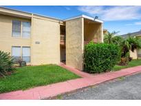 Exterior view of condo building at 3413 Clark Rd # 114, Sarasota, FL 34231