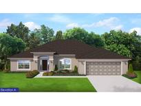 One-story house with a two-car garage and a landscaped front yard at 5778 Englewood Rd, Venice, FL 34293
