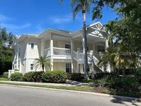 Inviting condo building exterior, showcasing a charming architectural design and landscaping at 3604 54Th W Dr # 103, Bradenton, FL 34210