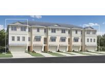 Modern townhouses with attached garages at 9947 Key Haven Rd, Seminole, FL 33777