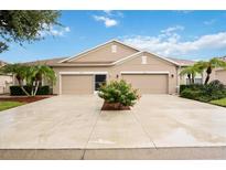 Two-car garage and attractive landscaping at 4405 Lenox Blvd, Venice, FL 34293