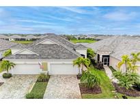 Two-car garage villa with a lovely yard at 2942 Trustee Ave, Sarasota, FL 34243