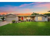 Ranch style home with a covered porch at 2611 Sunnyside St, Sarasota, FL 34239