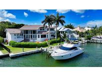 Luxury waterfront home with private boat dock, offering stunning water views at 495 Mckinley Dr, Sarasota, FL 34236