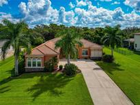 Single-Gathering home with lush landscaping at 111 172Nd E St, Bradenton, FL 34212