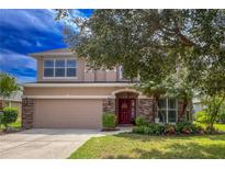 Two story house with two car garage at 12423 23Rd E St, Parrish, FL 34219