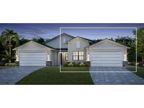 Two-car garage home with light colored siding at 18868 Dayspring Pl, Venice, FL 34293