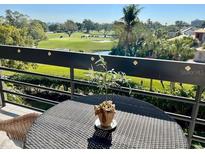 Balcony with golf course view at 1065 Gulf Of Mexico Dr # 302, Longboat Key, FL 34228