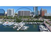 Aerial view of waterfront highrise building near marina at 1255 N Gulfstream Ave # 1003, Sarasota, FL 34236