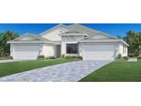 Two-story home with double garage and attractive curb appeal at 18905 Dayspring Pl, Venice, FL 34293