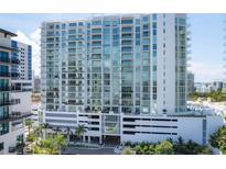 Modern high-rise building with water views and resort-style amenities at 301 Quay Commons # 1209, Sarasota, FL 34236