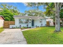 Newly renovated home with a modern front yard at 7121 65Th N Way, Pinellas Park, FL 33781