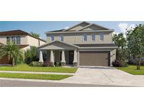 Two-story craftsman style home with attached garage at 782 Hillshire Pl, Spring Hill, FL 34609