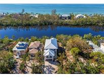 New construction home with water access and amazing waterfront views at 8030 Midnight Pass Rd, Sarasota, FL 34242