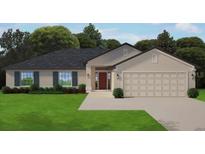 One-story home with a two-car garage and a neatly landscaped lawn at 6105 Bodmin Ln, North Port, FL 34291
