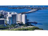 Aerial view of waterfront high-rise building at 990 Blvd Of The Arts # 404, Sarasota, FL 34236