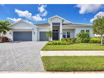 Beautiful two-car garage home with landscaped yard at 7924 Redonda Loop, Lakewood Ranch, FL 34202