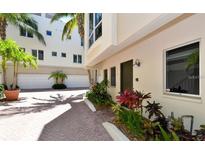 Townhouse with front door and parking area at 235 Cocoanut Ave # 113C, Sarasota, FL 34236