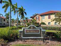 Community sign for Muirfield, a residential community at 228 Crew Ct, Sarasota, FL 34243
