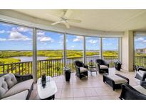 Spacious balcony with scenic waterway views at 393 N Point Rd # 801, Osprey, FL 34229