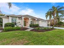 Charming one-story home with lush landscaping at 11332 Rivers Bluff Cir, Lakewood Ranch, FL 34202