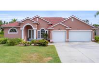 Single-Gathering home with three car garage at 7341 Featherstone Blvd, Sarasota, FL 34238
