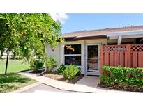 Exterior view of condo with private entrance and landscaping at 2911 74Th W St # 2276, Bradenton, FL 34209
