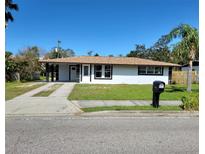 Updated ranch style home with driveway and yard at 2919 Bayshore Gardens Pkwy, Bradenton, FL 34207