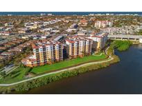 Aerial view of a luxury condo building near the water at 157 Tampa Ave # 707, Venice, FL 34285
