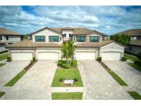 Luxury three-unit building with attached garages at 17825 Gawthrop Dr # 103, Bradenton, FL 34211