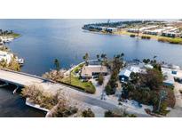 Single-Gathering home on waterfront lot with canal access at 543 Key Royale Dr, Holmes Beach, FL 34217