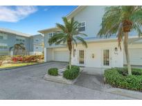 Condo exterior showcasing entrance and parking at 3919 Cape Haze Dr # 506, Rotonda West, FL 33947