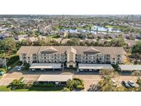 Aerial view of community, featuring building, parking, and waterfront at 7201 29Th Avenue W Dr # 309, Bradenton, FL 34209