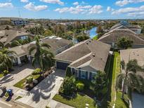 Single-Gathering home with a two-car garage and a nicely landscaped yard at 805 Molly Cir, Sarasota, FL 34232