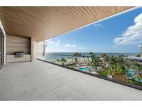 Spacious balcony with ocean view and grilling station at 1561 Gulf Of Mexico Dr # 403, Longboat Key, FL 34228