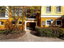 Building exterior with landscaped walkway and entryway at 99 Vivante Blvd # 99315, Punta Gorda, FL 33950