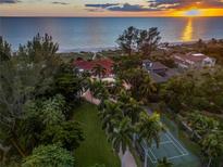 Beachfront estate with tennis court and ocean views at 5919 Gulf Of Mexico Dr, Longboat Key, FL 34228