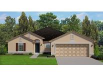 One-story home with a two-car garage and attractive landscaping at 6195 Mangrove Ave, North Port, FL 34288