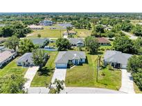 Aerial view of single-Gathering home and neighborhood at 7648 Totem Ave, North Port, FL 34291