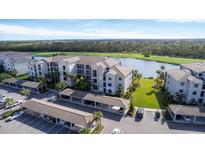 Luxury condo community with lake and golf course views; covered parking at 17626 Gawthrop Dr # 201, Bradenton, FL 34211