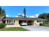 Two-unit building with carport and patio at 390 301 W Blvd # 27B, Bradenton, FL 34205