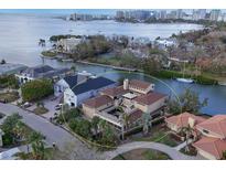 Waterfront property aerial view, showcasing a large home and private dock at 1348 Harbor Dr, Sarasota, FL 34239