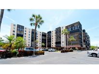 Exterior view of RainTree Condominiums, featuring ample parking at 2901 26Th W St # 818, Bradenton, FL 34205