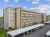 Multi-story apartment building with covered parking at 3820 Ironwood Ln # 106-I, Bradenton, FL 34209