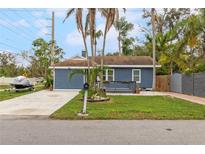 Cute blue house with a landscaped yard at 4403 Pike Ave, Sarasota, FL 34233